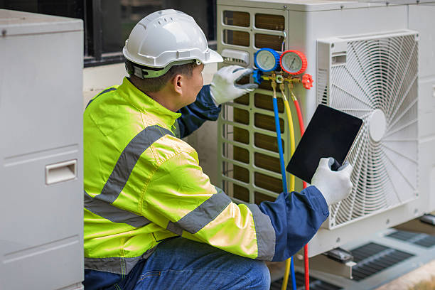 Professional Hvac technician working in Nokomis, IL